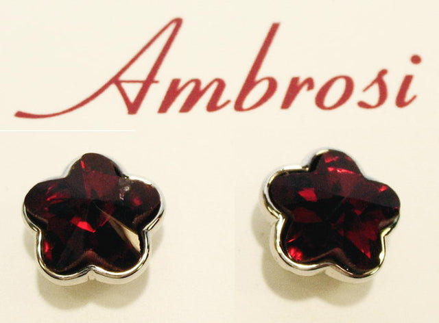 Red flower-shaped crystal stud earrings, featuring Siam glass stone set in palladium for elegance and versatility.