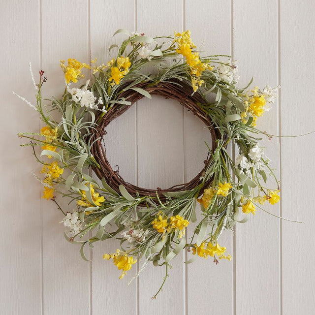 Vibrant 40cm artificial Easter wreath featuring yellow flowers and lush foliage, perfect for Spring decor.