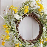 Vibrant 40cm artificial Easter wreath with yellow flowers and lush foliage, perfect for spring decor and eco-friendly packaging.