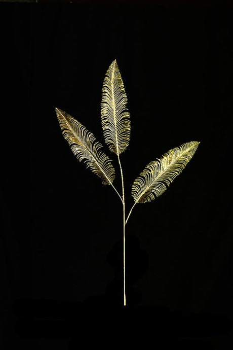 Gold artificial fern sprays set of 4, each with 3 lifelike fern pieces, perfect for elegant home decor and floral arrangements.