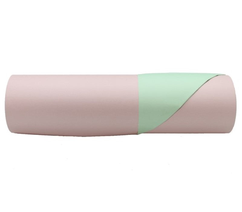 Two-tone kraft paper roll, one side champagne pink and the other sage, perfect for crafting and wrapping projects.
