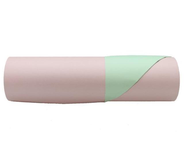 Two-tone kraft paper roll, one side champagne pink and the other sage, perfect for crafting and wrapping projects.