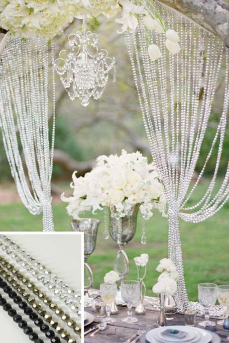 Elegant black metallic garland featuring 10mm beads, perfect for decor in parties, weddings, or home settings.