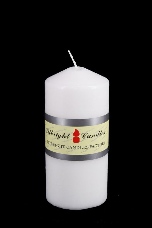 Set of 24 white unscented pressed wax pillar candles, ideal for enhancing ambiance at events and stylish home decor.