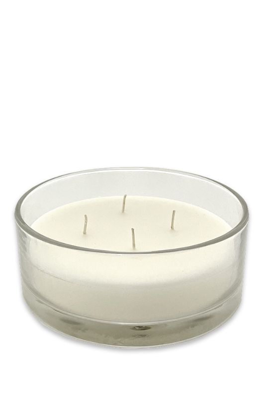 Large clear glass candle with four wicks, 835g wax, and 40-hour burn time for ambiance and decor enhancement.