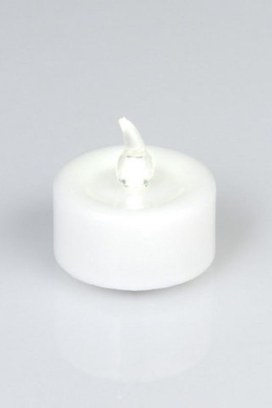 Set of 20 warm white LED tealights with flickering effect, safe and flameless for creating ambiance indoors or outdoors.