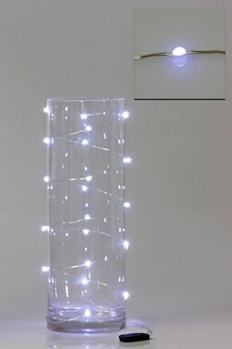 Pure white LED seed lights on copper wire, perfect for decorating floral arrangements and creating enchanting atmospheres.