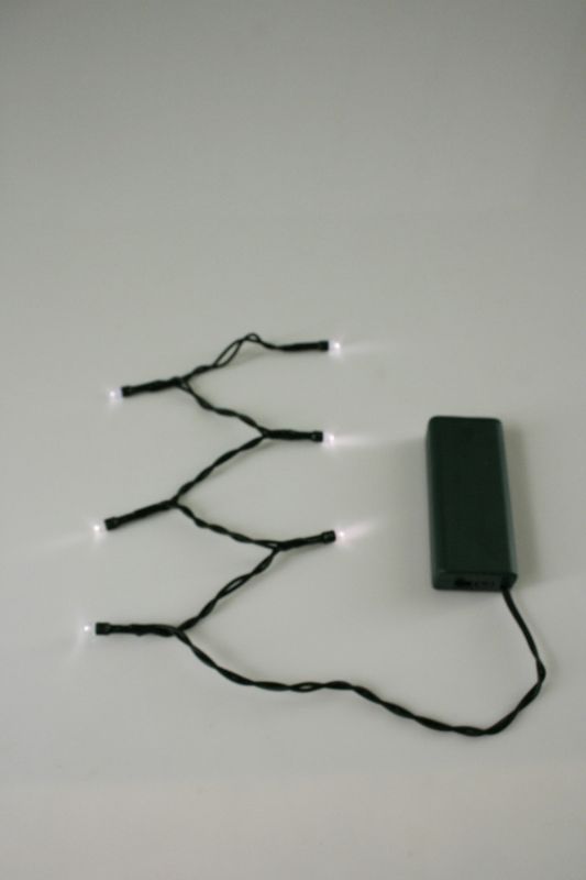 Warm white LED string lights set of 20, ideal for cozy decorations, indoors or outdoors, lasting ambiance, 55cm long.