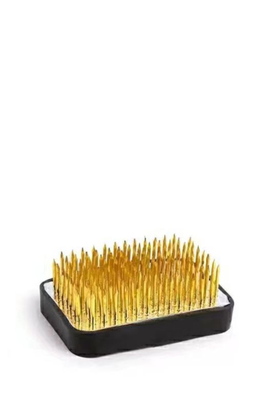 Set of 4 black Ikebana Kenzan flower frogs with nail spikes for secure flower arrangements and vase protection.