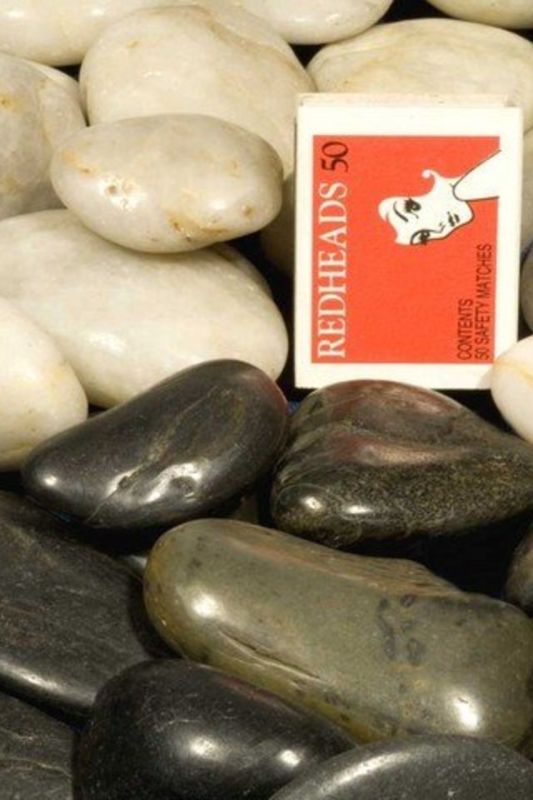 Set of 18 polished white river pebbles, each 4x5cm, perfect for decor, gardens, and stylish projects.