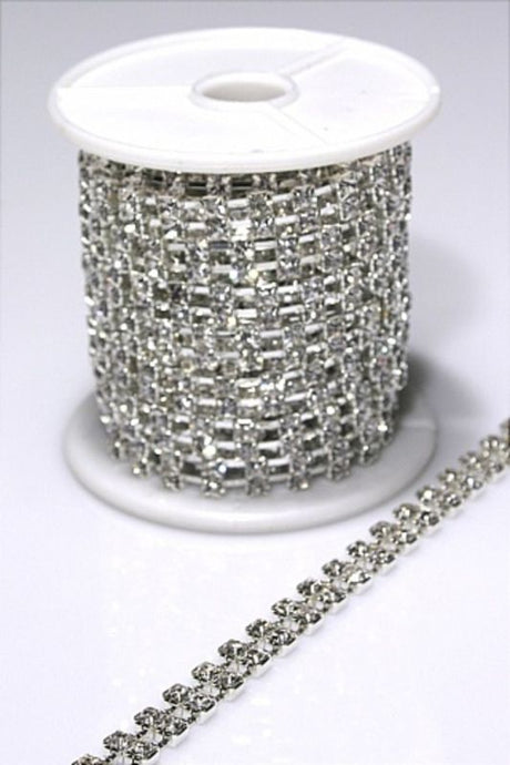 Decorative silver garland with sparkling twin diamante chain, featuring 294 stones/m, perfect for elegant events and decor.