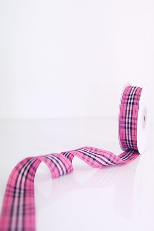 Vibrant Fiesta Tartan Ribbon, 23mm wide, perfect for gift wrapping and DIY crafts with a classic tartan design.