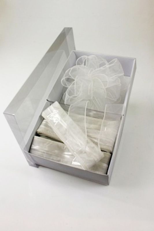 White pull bows in a display of 12, measuring 4.5cm, perfect for elegant gift wrapping and decorating any occasion.