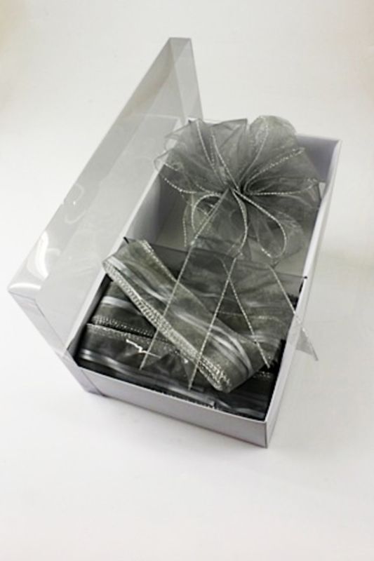 Elegant white pull bow with sparkling silver edge, 4.5cm height and 4.5m length, perfect for stylish gift wrapping.