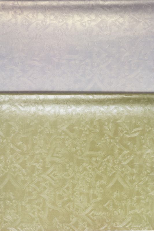 Elegant white wrapping paper with swirl heart embossing, perfect for any occasion; 20 sheets, 52 x 75 cm.
