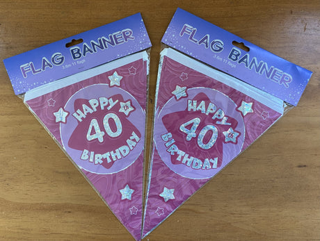 Vibrant pink banners for a 40th birthday celebration, perfect for adding festive cheer to any party setting.