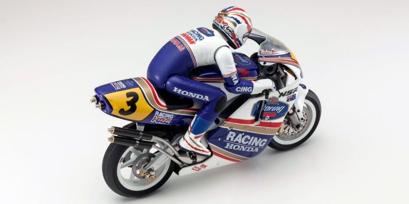 Radio control motorcycle Kyosho EP Kit M/bike 1/8 Honda NSR, replicating the 1991 Honda NSR500 with precision engineering.