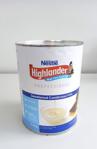 Rich and creamy Highlander sweetened condensed milk in a 2.6kg tin, perfect for baking and dessert-making.