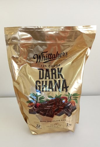 Dark Ghana chocolate pips 72% cocoa in a 2kg Whittakers packet, perfect for baking or snacking.