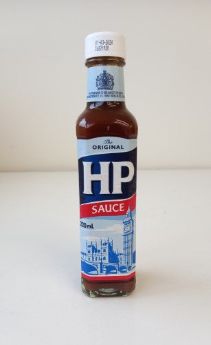 HP Sauce 225ml bottle, an authentic British condiment enhancing meals with rich, tangy flavor for any culinary creation.