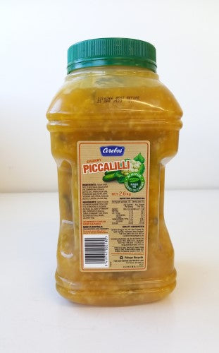 Relish Piccalilli Cerebos 2.6kg jar featuring fresh veggies and spices, perfect for enhancing various dishes and gourmet platters.