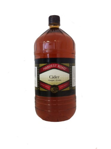 Bottle of Harvest Road Vinegar Cider, made from organic apples, ideal for dressings and marinades.