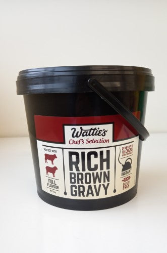 Wattie's gluten-free rich brown gravy mix tub, perfect for enhancing meats and vegetables with savory flavor.