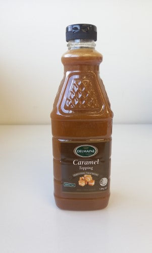 Delmaine Topping Caramel 1.3kg bottle, perfect for drizzling over desserts like ice cream and cakes for added sweetness.