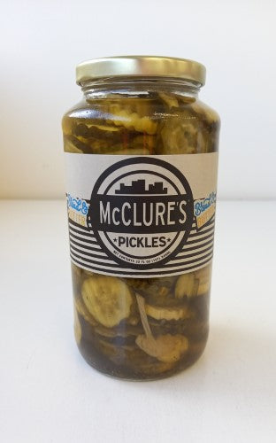 A 907-gram jar of McClure’s Bread & Butter pickles, showcasing sweet and tangy handcrafted slices for versatile snacking and meals.