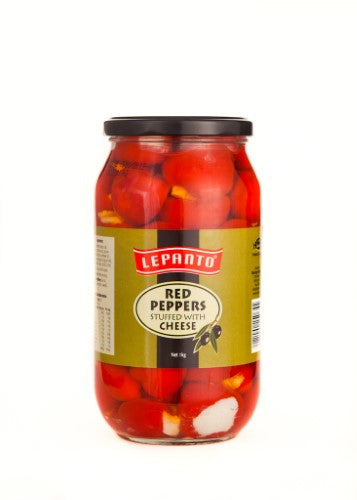 Vibrant red peppers stuffed with rich cheese in a 1kg jar, perfect for appetizers and enhancing meals.