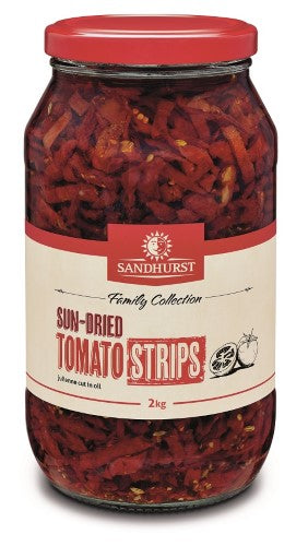 Sundried tomato strips in a 2kg jar, packed with rich umami flavor for enhancing pizzas, salads, and pasta.