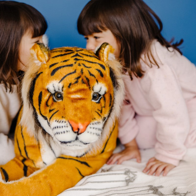 Lifelike 40-inch Melissa & Doug plush Siberian tiger with realistic stripes and paws, perfect for imaginative play and cuddly adventures.