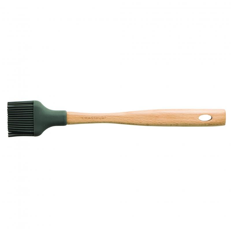 Silicone basting brush with ergonomic wooden handle, heat-resistant for easy glazing and basting in the kitchen or grill.