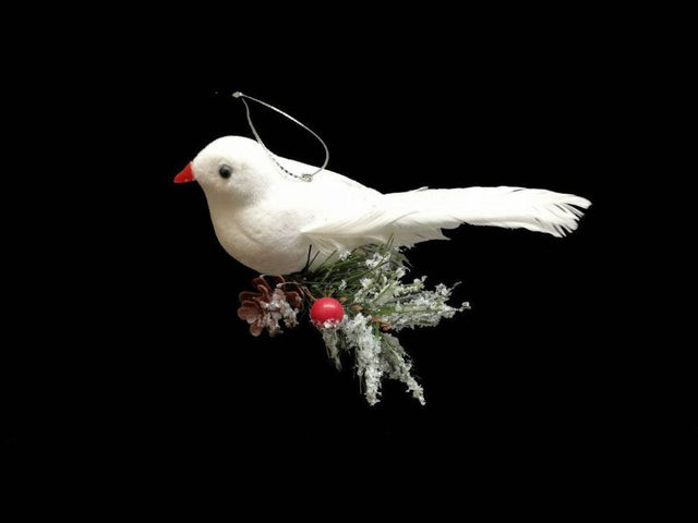 White dove ornament with pine decor, measuring 10cm, adds elegance and symbolizes hope for holiday celebrations.