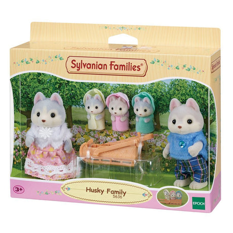 Alt text: "Sylvanian Families Husky Family set featuring five articulated figures with grey and brown fur in cozy hooded outfits."