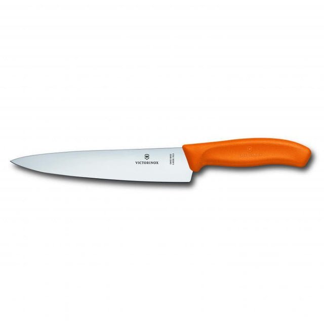 Victorinox Cooks Carving Knife with 19cm stainless steel blade and ergonomic orange handle for precise slicing.