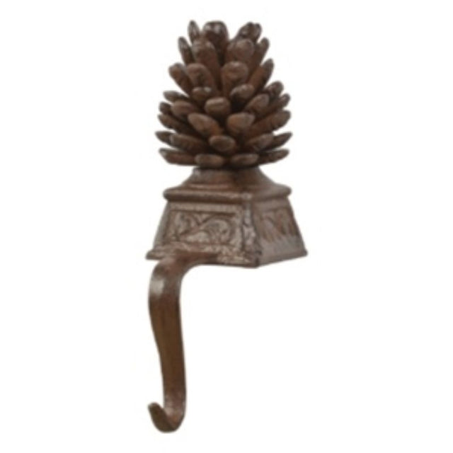 Cast iron stocking hanger featuring a rustic acorn design, perfect for secure holiday decoration on mantles.