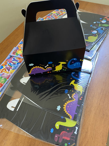 Pack of 6 dinosaur-themed party favor boxes, perfect for kids' celebrations and easy to assemble from sturdy cardboard.