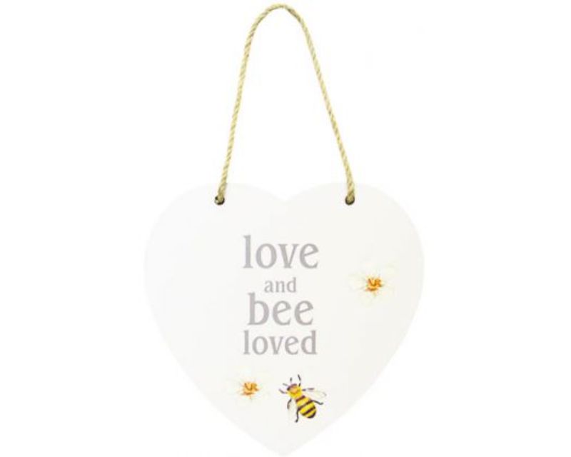 Heart-shaped MDF sign with twine hanger displaying "Love, and Bee Loved", perfect for warm home decor.