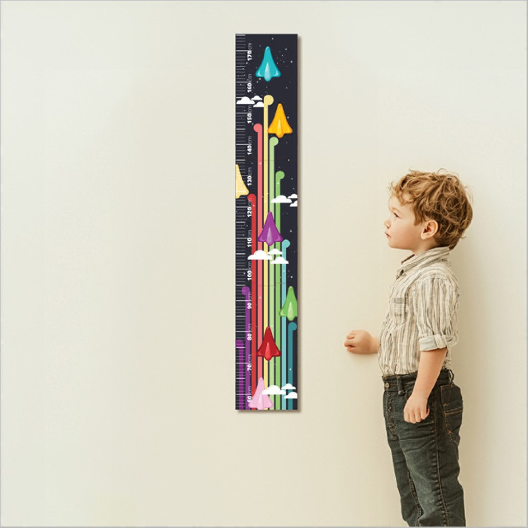 Colorful patchwork jet planes height chart for tracking child's growth, featuring Koru design and easy-to-assemble puzzle pieces.