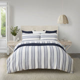 Blue and white jacquard stripe duvet cover set with matching striped pillowcases, made from certified cotton and linen.