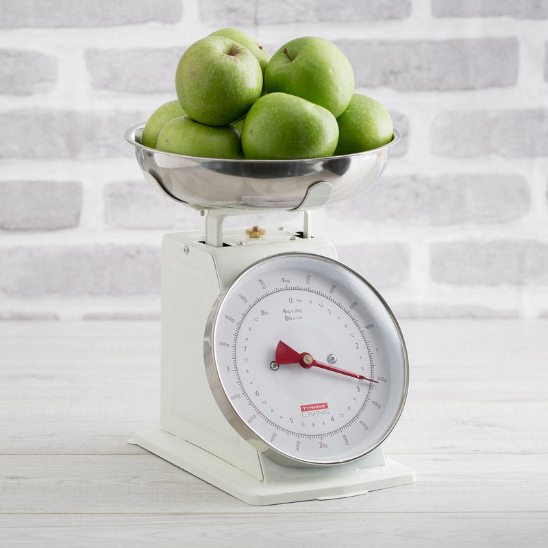 Cream-colored Typhoon Living mechanical kitchen scales with stainless steel bowl, easy-to-read dial, and vintage design.