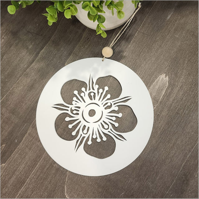 Hanging acrylic circle wall art featuring a Manuka design in white, ideal for elevating modern home decor.