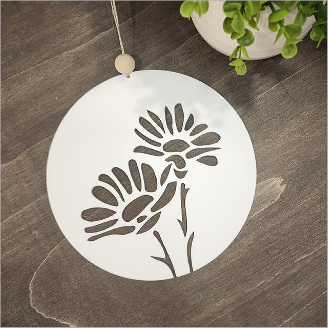 Stylish Kiwiana wall art featuring a white acrylic daisy design, perfect for modern decor, 200mm diameter, ready to hang.