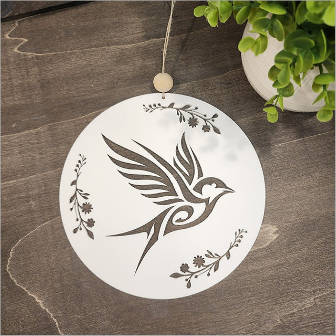 Kiwiana Wall Art featuring a white acrylic Welcome Swallow, 200mm circle, perfect for minimalist decor and easy to hang.