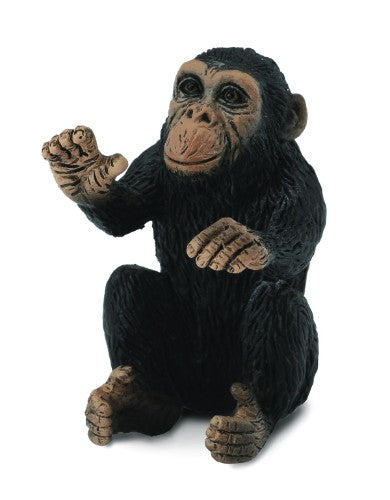 Small chimpanzee cub hugging figurine by Collecta, showcasing lifelike detail and charm, perfect for collectors.