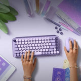 Vibrant Logitech POP Keys Wireless Mechanical Keyboard with customizable emoji keys for a fun and productive workspace.