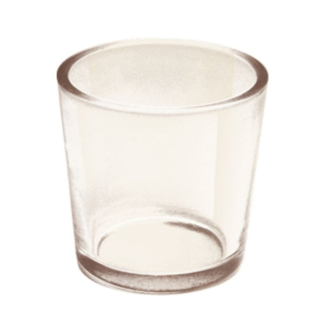 Clear glass votive holder (57mm) reflecting candlelight, perfect for enhancing home ambiance and decor versatility.