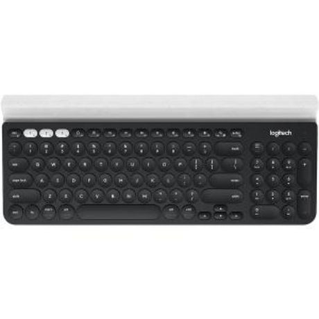 Logitech K780 Multi-Device Wireless Keyboard in white, featuring QWERTY layout, device switching, and integrated phone cradle.