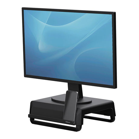 Fellowes Breyta Monitor Riser: adjustable height stand for ergonomic monitor placement, featuring a sleek design and charging channel.